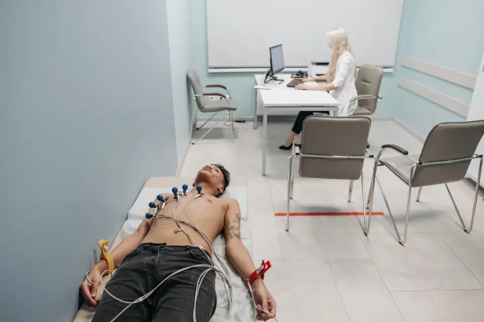 A veterinarian gently assessing a dog&#x27;s behavior during an exam