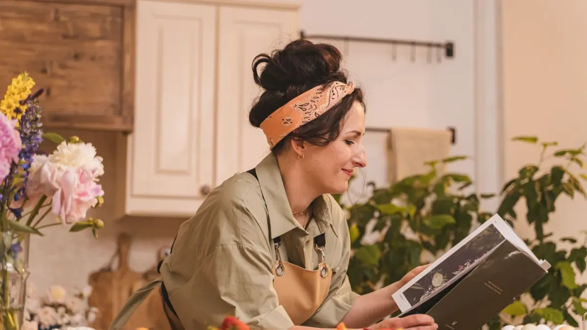 An owner reading the ingredient and guaranteed-analysis panel on a bag of dog food
