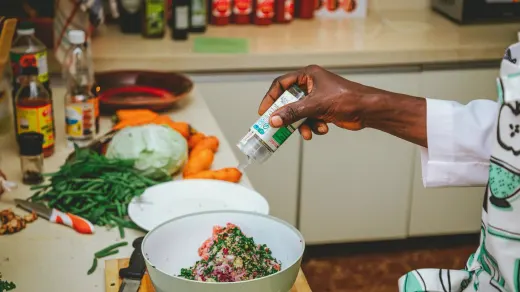 Dog owner preparing a meal