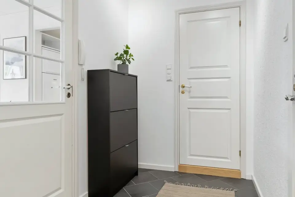Non-slip rug runner laid along a hallway floor
