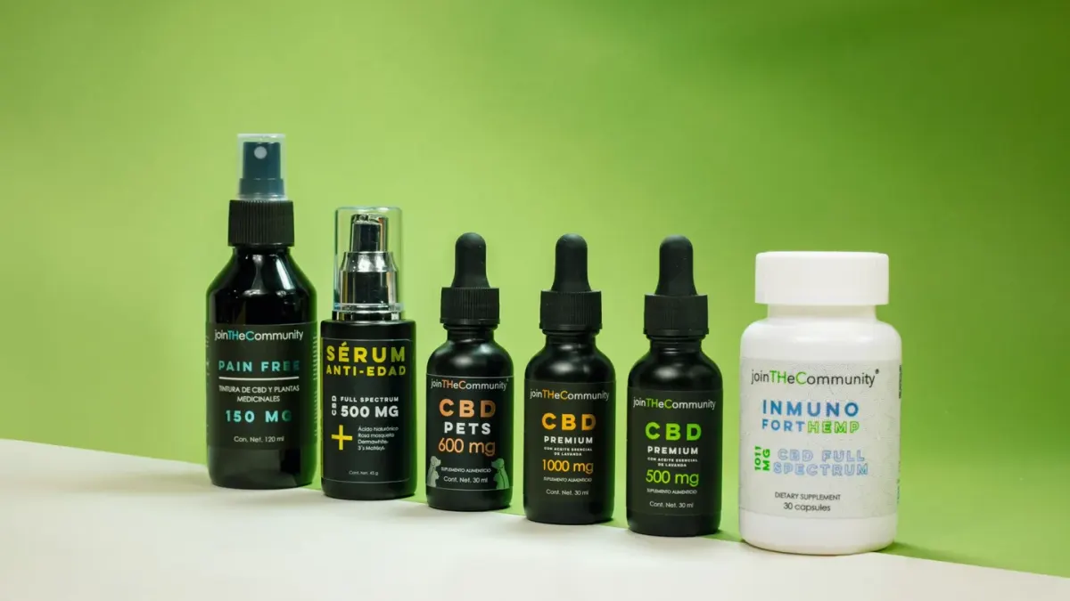 Rows of small dog supplement bottles lined up next to a scoop and scale